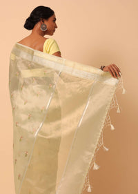 White Kora Silk Woven Saree With Floral Motif Work And Unstitched Blouse Piece