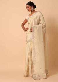 White Saree In Tissue Silk With Gota Patti Work And Unstitched Blouse Piece