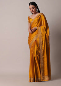 Mustard Satin Saree With Gold Tone Embellishments And Unstitched Blouse Piece