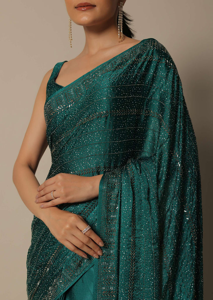 Dazzling Green Saree With An Unstitched Blouse Fabric