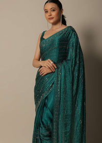 Dazzling Green Saree With An Unstitched Blouse Fabric