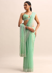 Mint Blue Organza Saree With Cutdana Embroidery And Scallop Border With Unstitched Blouse