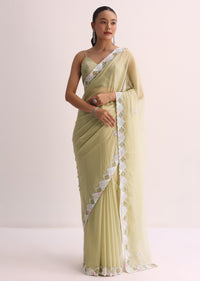 Green Saree With Embroidered Border And Unstitched Blouse