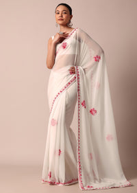 White Saree With Floral Embroidery And Unstitched Blouse Piece