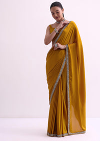 Yellow Saree In Satin With Mirror Work And Unstitched Blouse Fabric