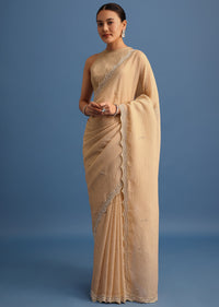 Beige Tissue Saree With Moti And Cutdana Border And Unstitched Blouse