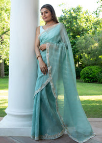 Turquoise Blue Crush Tissue Cutdana Work Saree With Embroidered Border