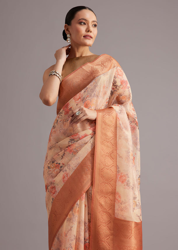 Light Yellow Tissue Silk Floral Printed Saree With Zari Woven Border