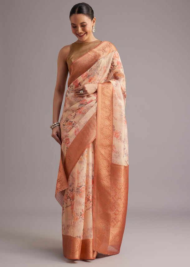 Light Yellow Tissue Silk Floral Printed Saree With Zari Woven Border