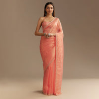 Peach Tissue Saree With Stones Cutdana Embellishments And Scallop Border