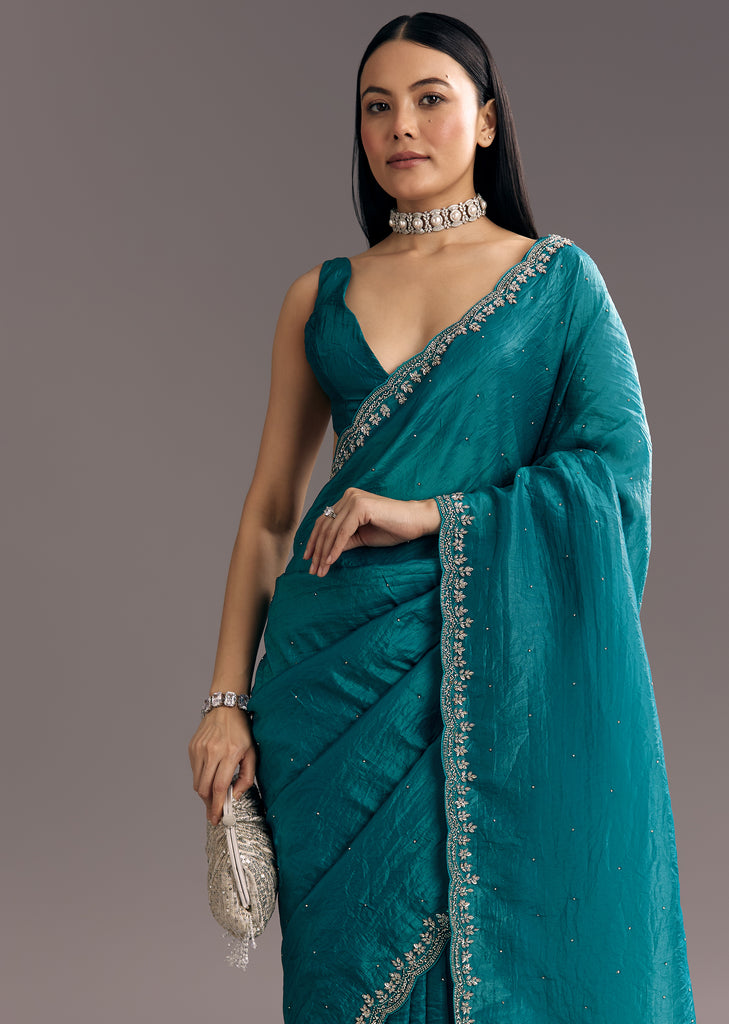 Teal Blue Crushed Tissue Stone Embellished Saree With Cutdana Scallop Border