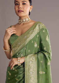 Pista Green Saree With Zari Weave And Stone Embellishments