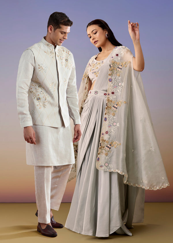 Blue Festive Duo – Cape Pre Draped Saree Set For Her And Silk Kurta Jacket Set For Him