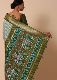 Green Silk Printed Saree With Patola Detail And Unstitched Blouse Piece