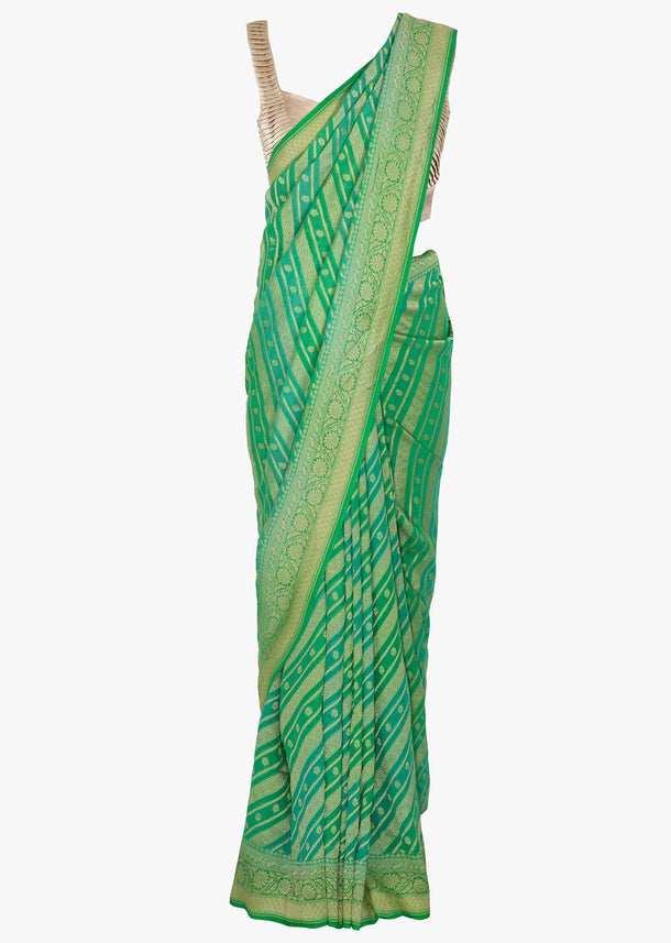 Shaded Green georgette saree with weaved work in stripes and floral butti