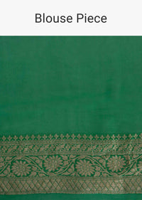 Shaded Green georgette saree with weaved work in stripes and floral butti