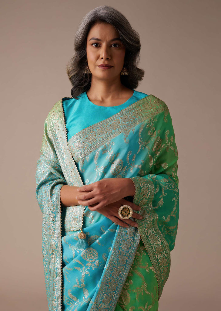 Sea Green And Turquoise Saree In Georgette With Woven Floral Jaal