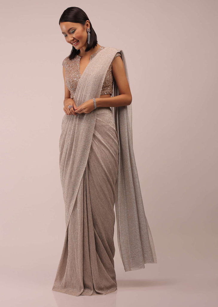 Shell Shimmer Crush Ready Pleated Saree With A Crop Top In 3D Flower And Moti Embroidery