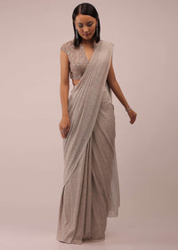 Shell Shimmer Crush Ready Pleated Saree With A Crop Top In 3D Flower And Moti Embroidery