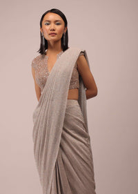 Shell Shimmer Crush Ready Pleated Saree With A Crop Top In 3D Flower And Moti Embroidery