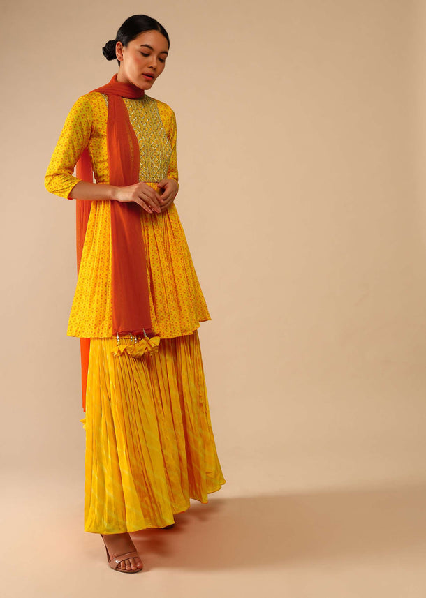 Honey Yellow Sharara Suit In Crepe With Bandhani And Lehariya Print Paired With Moti Embroidered Peplum Kurti