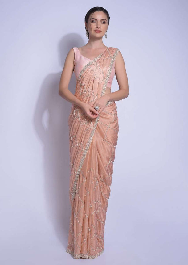 Shrimp Peach Saree Embellished With Checks And Floral Pattern Online - Kalki Fashion