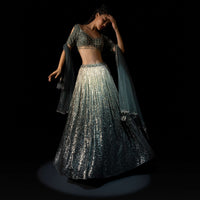 Silver And Mineral Green Shaded Sequins Lehenga With Mineral Green Hand Embroidered Choli Having Keyhole Sleeves Online - Kalki Fashion