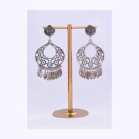 Silver coated dangler earring with floral cut work only on Kalki