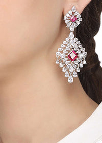 Silver Finish Earrings With White Diamonds And Red Zircon Stones In Cut Out Design By Aster
