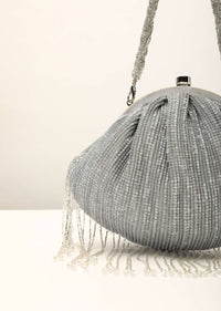 Silver Clutch In Crushed Sequins Fabric With Cut Dana Fringes On The Edges