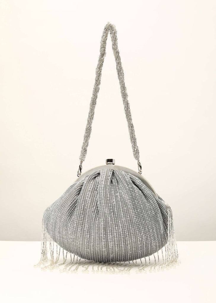 Silver Clutch In Crushed Sequins Fabric With Cut Dana Fringes On The Edges