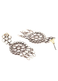 Silver Earrings Adorned With Checker Stone In Floral Motifs Made In Sterling Silver By Sangeeta Boochra