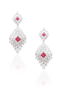 Silver Finish Earrings With White Diamonds And Red Zircon Stones In Cut Out Design By Aster