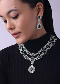 Silver Finish Long Necklace Studded With Faux Diamonds And Emerald Stones