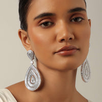 Silver Finish Statement Danglers With Zirconia Stones And Teardrop Motif