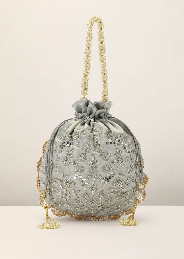 Silver Grey Potli In Satin Silk With Hand Embroidery Detailing Using Zardosi Work In Floral Design All Over