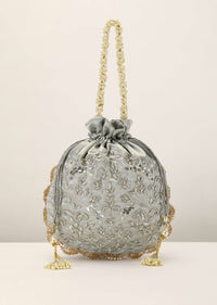 Silver Grey Potli In Satin Silk With Hand Embroidery Detailing Using Zardosi Work In Floral Design All Over