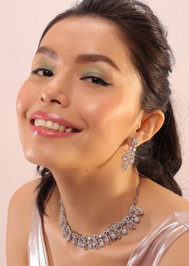 Silver Leaf-Flower Shaped Necklace With Earrings Studded In Bubble-Gum Pink Along With White Stones