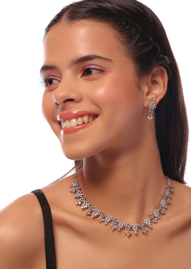 Silver Necklace And Earrings Set With White Stone Finish In A Floral Design