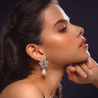 Silver Stud Earrings With Swarovski Studded Pentagon And Dangling Pearl