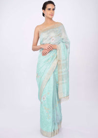 Sky blue linen saree in floral jaal embroidery only on kalki