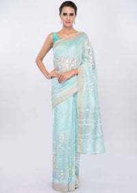 Sky blue linen saree in sequins and cut dana embroidery only on Kalki