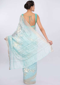Sky blue linen saree in sequins and cut dana embroidery only on Kalki