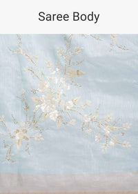 Sky blue linen saree in sequins and cut dana embroidery only on Kalki