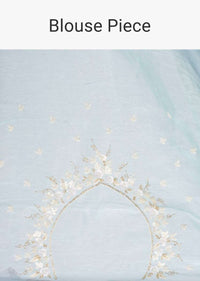Sky blue linen saree in sequins and cut dana embroidery only on Kalki