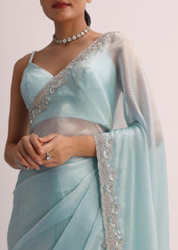 Sky Blue Saree WIth Embroidered Border And Unstitched Blouse