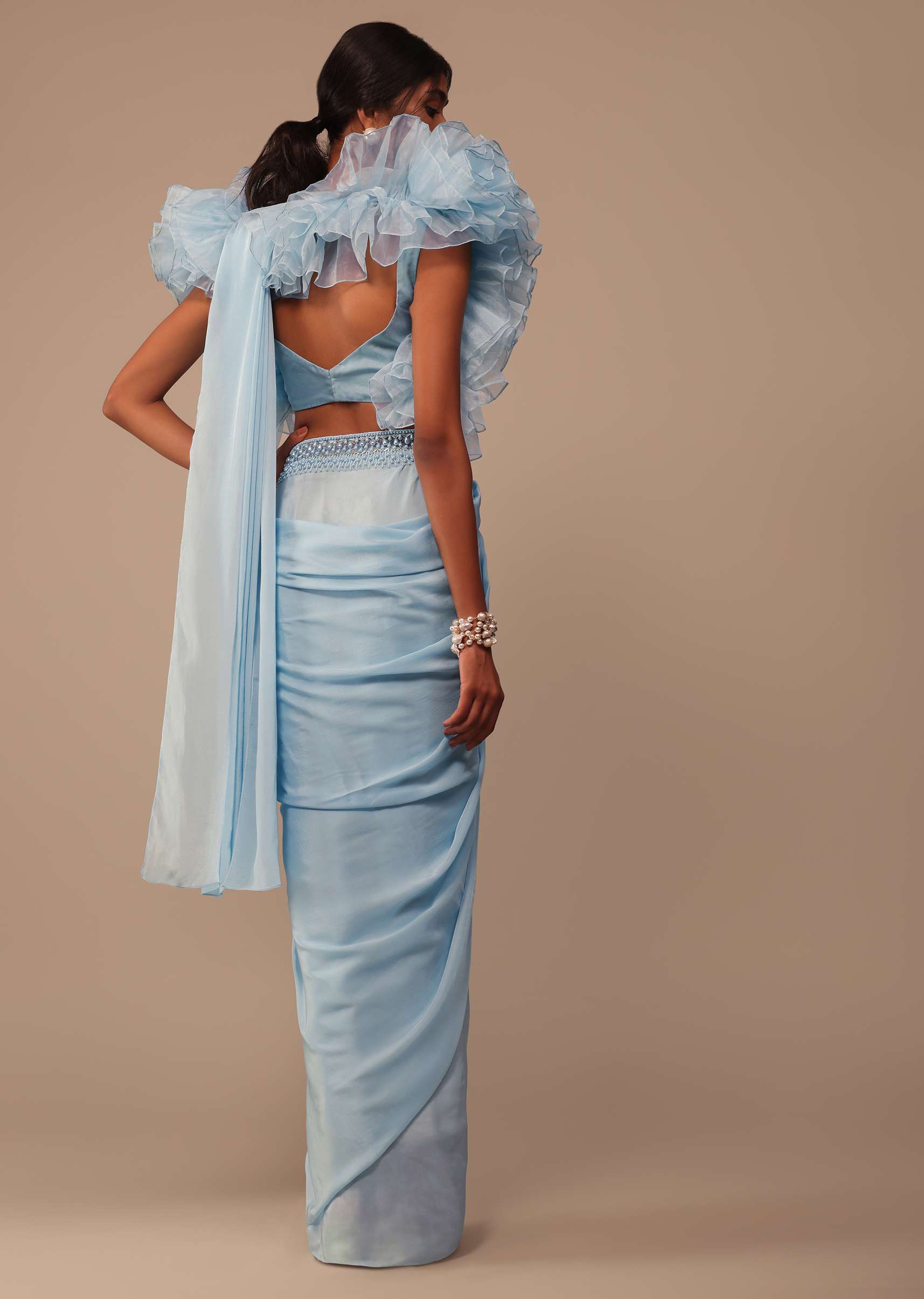 Sky Blue Saree With Organza Ruffle Blouse And Embroidered Belt