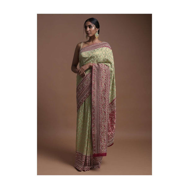 Spring Green Banarsi Saree In Georgette With Weaved Floral Mesh And Floral Jaal On The Rani Pink Pallu Online - Kalki Fashion