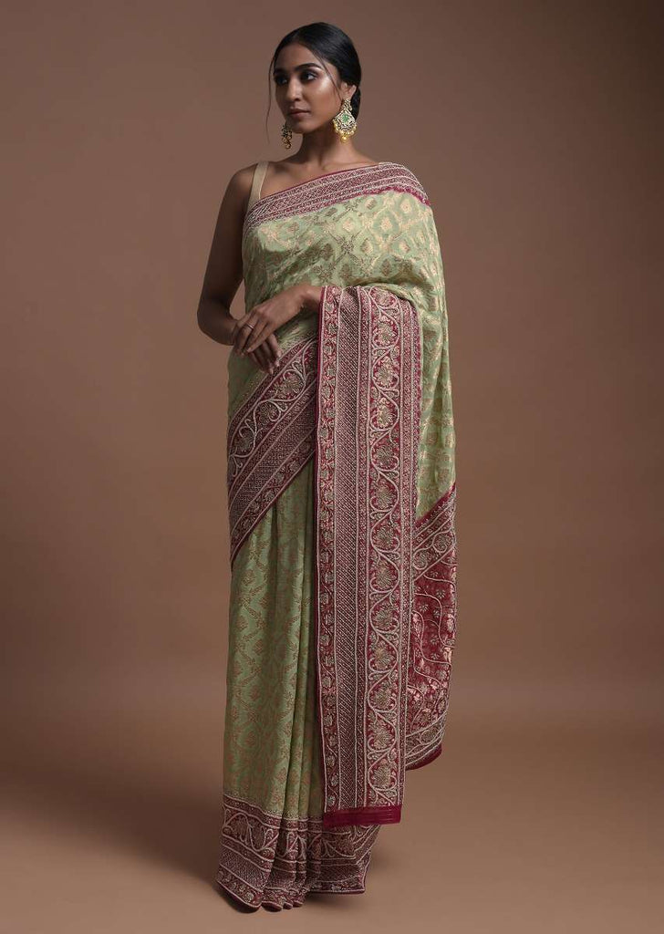 Spring Green Banarsi Saree In Georgette With Weaved Floral Mesh And Floral Jaal On The Rani Pink Pallu Online - Kalki Fashion