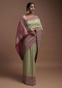 Spring Green Banarsi Saree In Georgette With Weaved Floral Mesh And Floral Jaal On The Rani Pink Pallu Online - Kalki Fashion